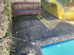 Pressure cleaned pool pavers before